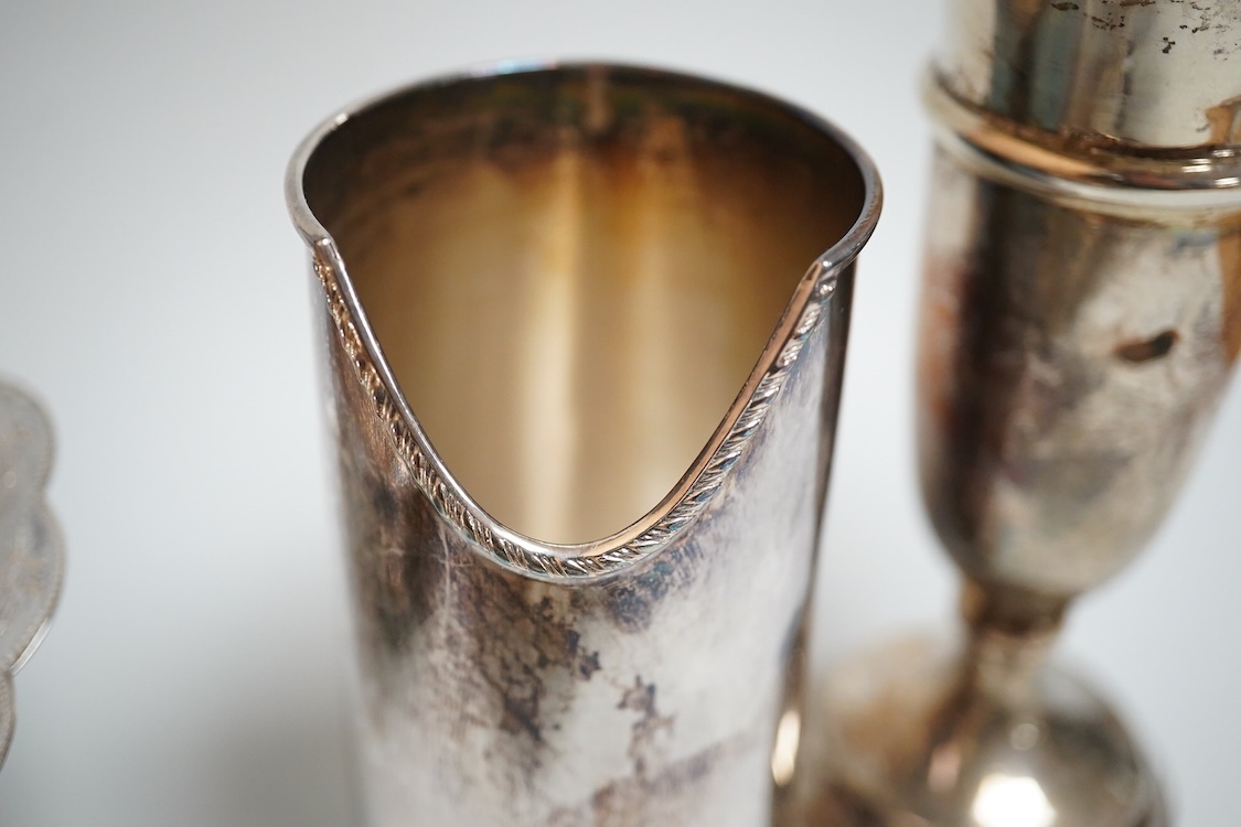 A modern silver oval pedestal sweetmeat bowl, by Mappin & Webb, Birmingham, 1987, 15.8cm, together with a small silver bottle holder, a silver mounted vase and a sterling two handled nut dish.